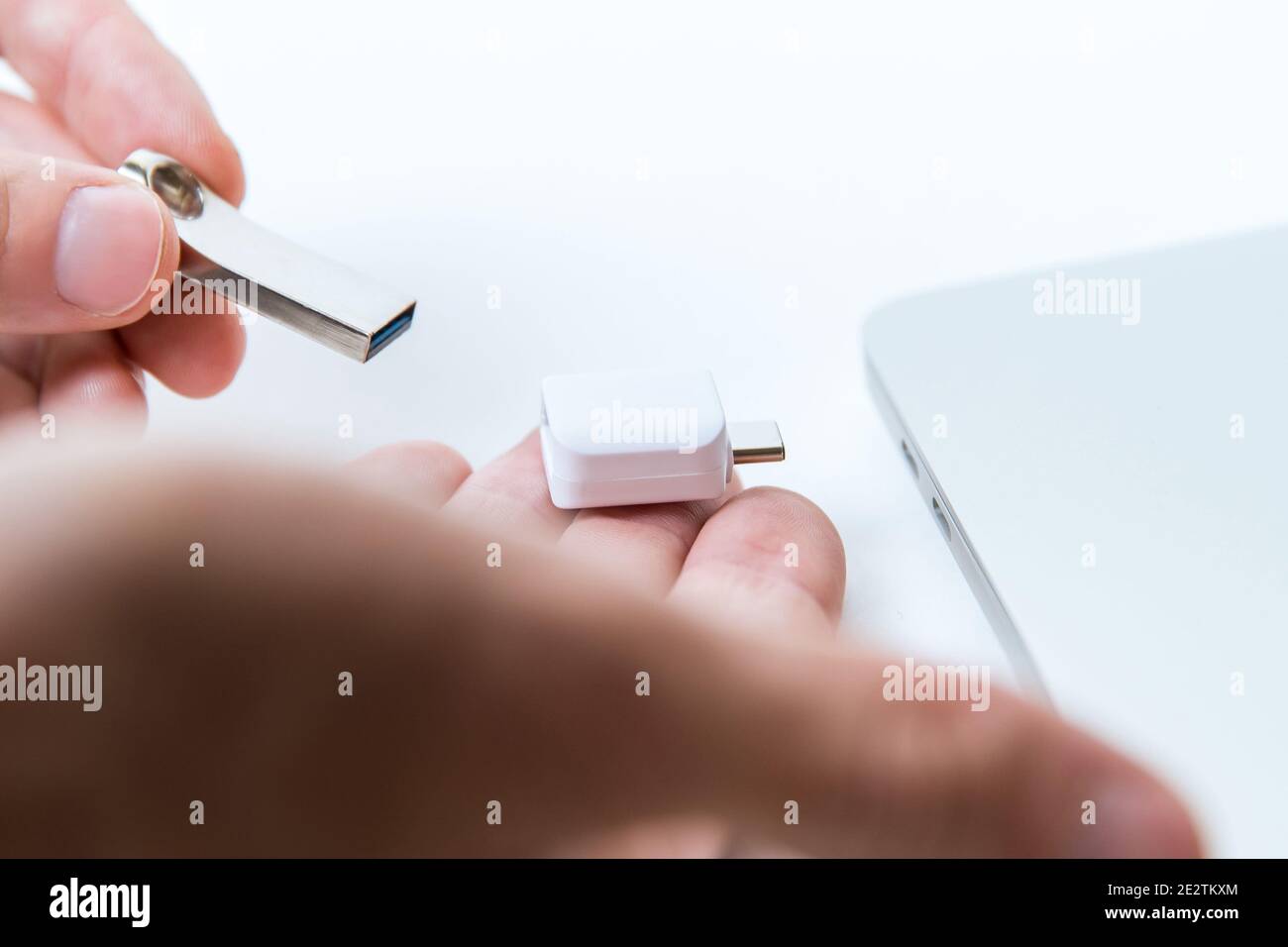 Man uses modern technologies to store memory and digital data Stock Photo