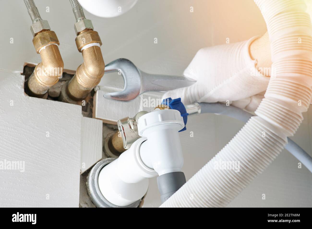 Installing drain pipes system in bathroom close up view Stock Photo Alamy