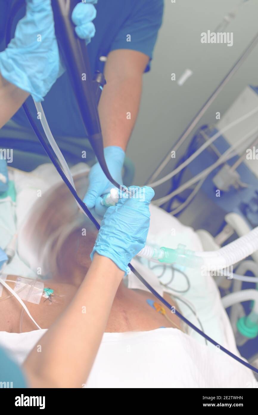 Comatose patient in the intensive care unit. Stock Photo