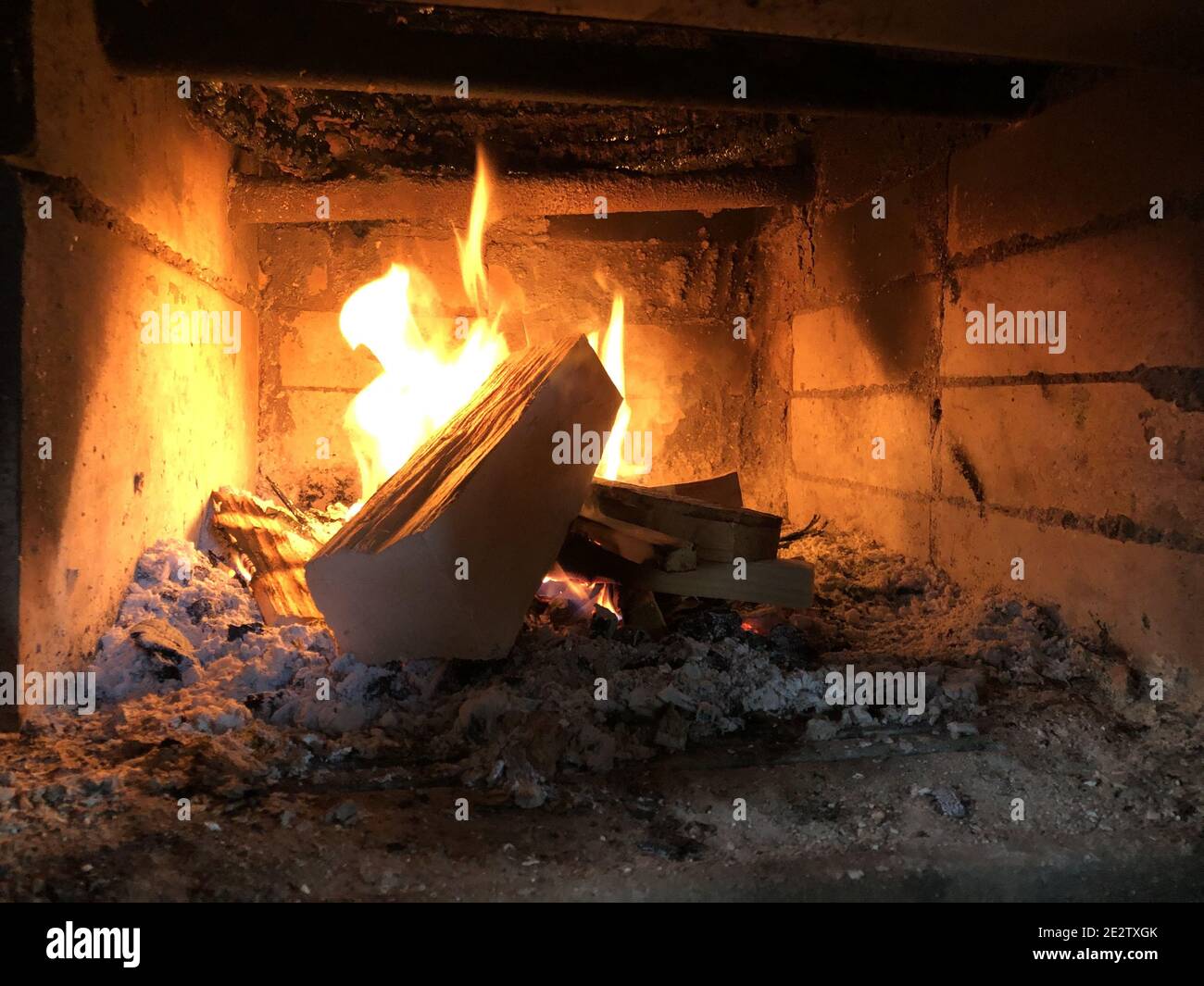 Closeup of woods burning in a small fireplace Stock Photo - Alamy