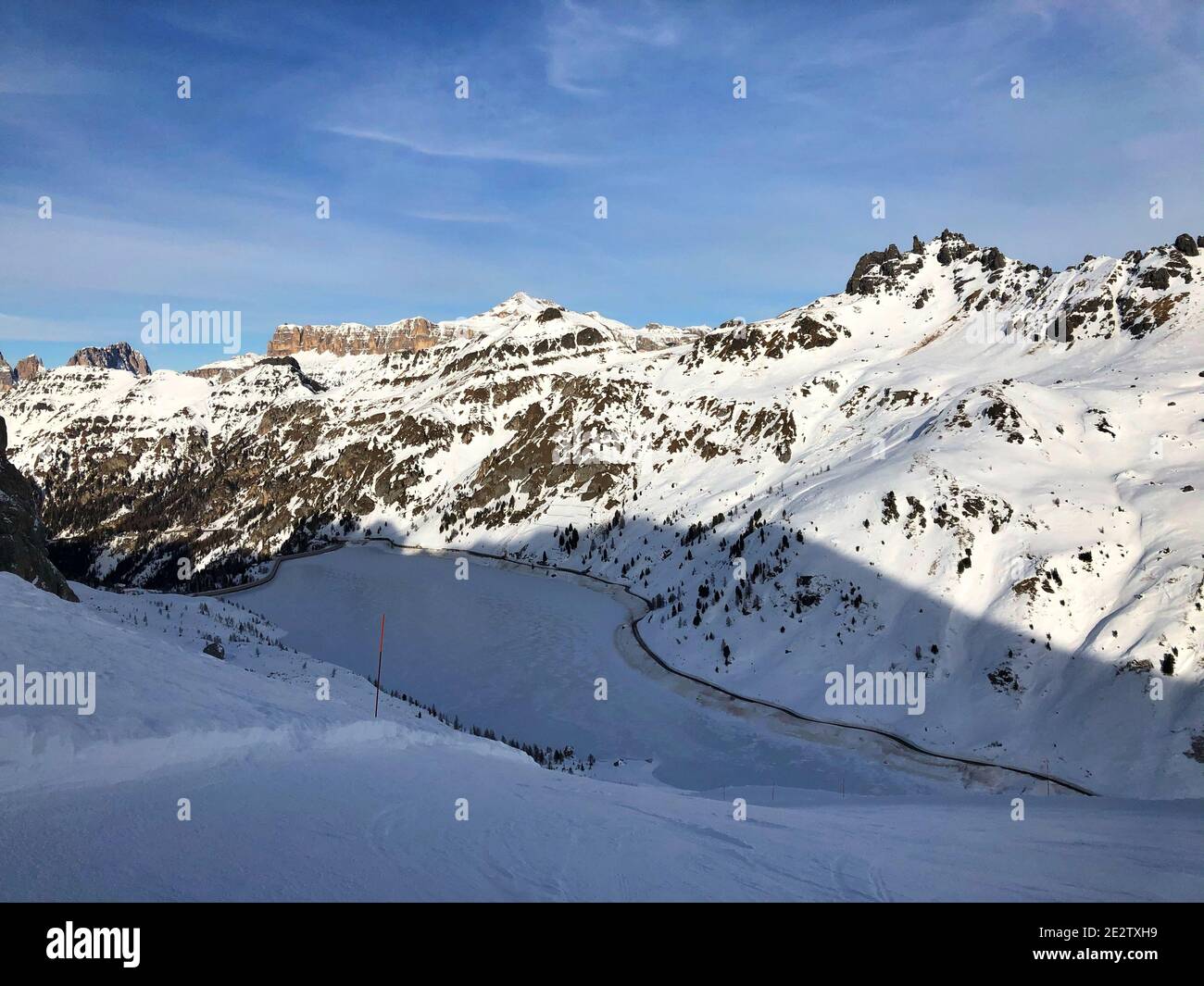 Snow-covered mountains captured on a sunny day Stock Photo - Alamy
