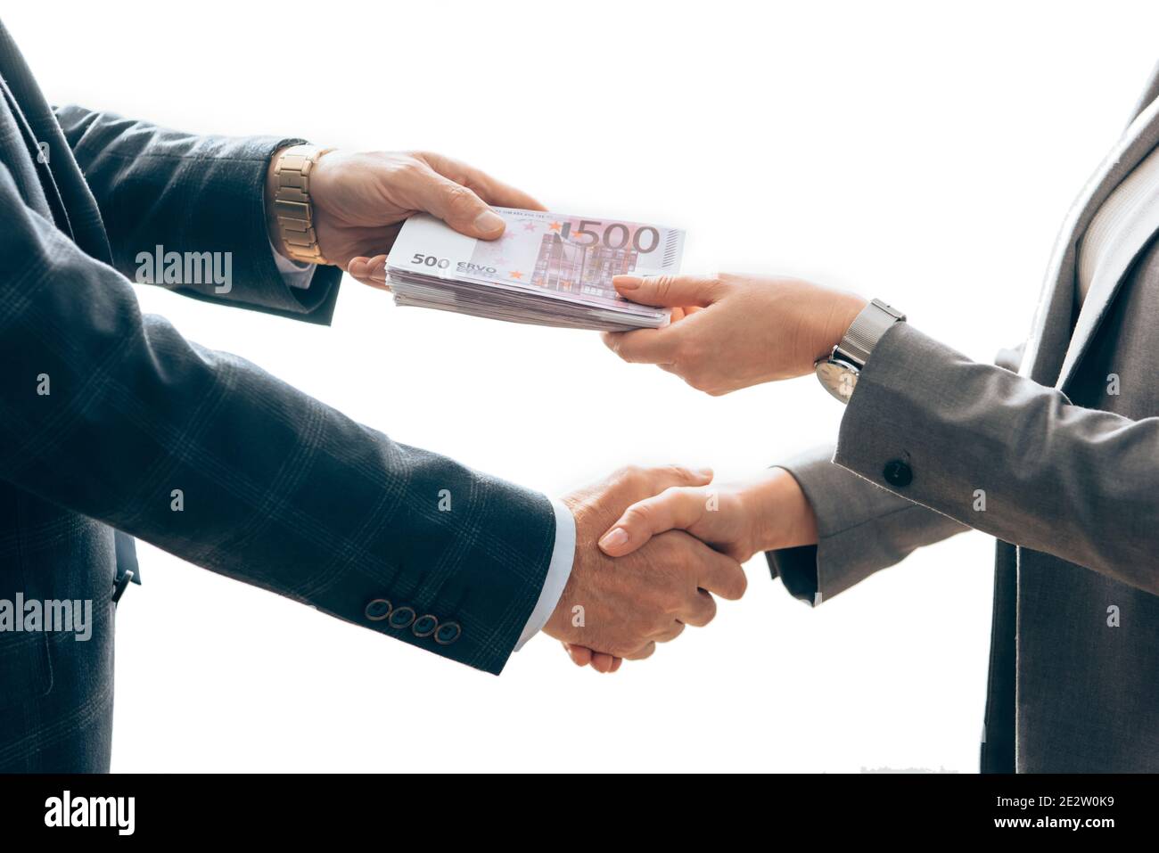 Cropped view of investor giving money and handshaking with businesswoman isolated on white Stock Photo