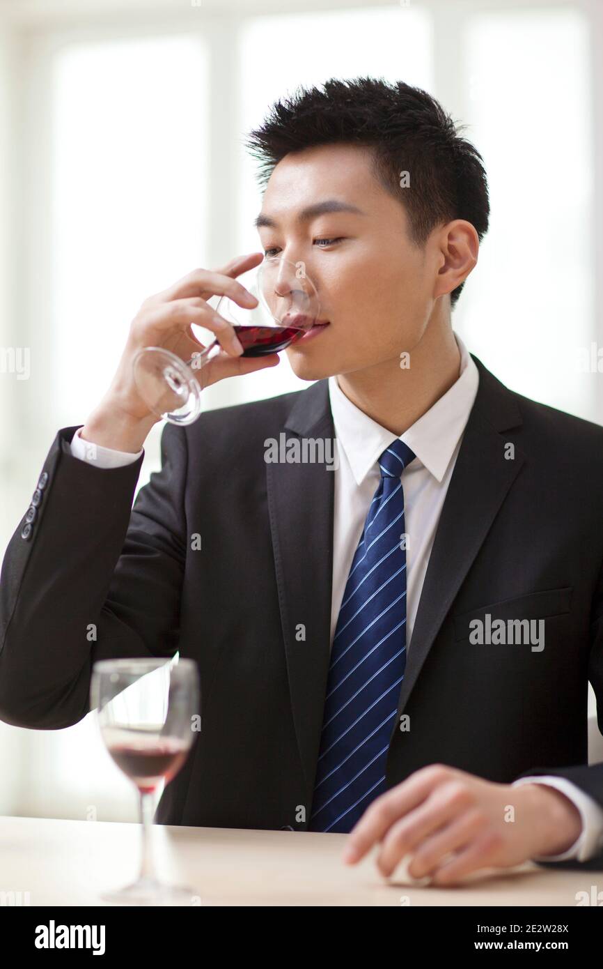 Portrait businessman desk drinking hi-res stock photography and images ...