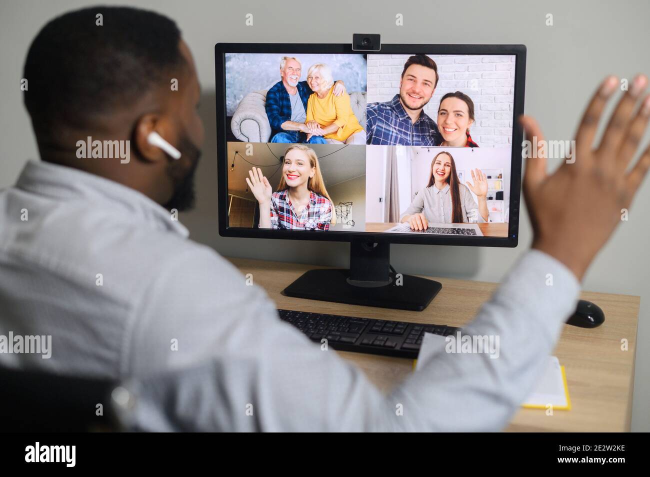 An African guy is talking via video call Stock Photo