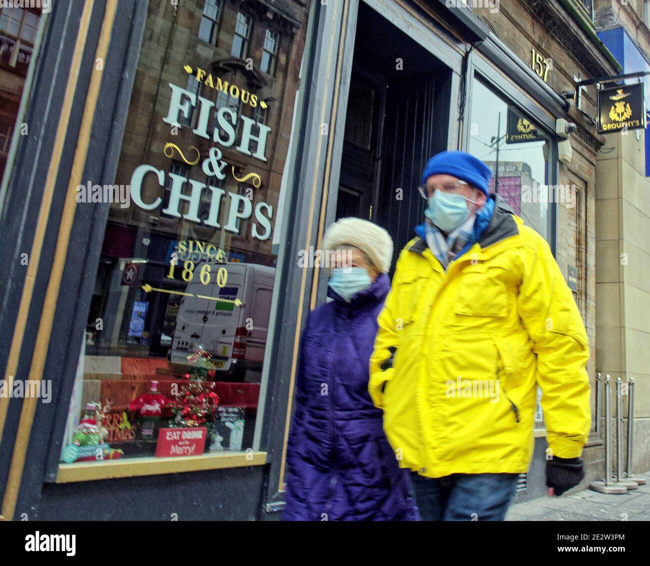 Glasgow, Scotland, UK. 15th January, 2021.Lockdown continues with sparsely filled streets and people sitting alone. Credit: Gerard Ferry/Alamy Live News Stock Photo