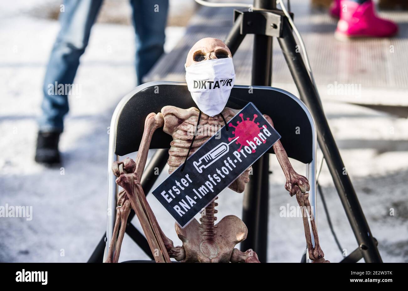 Fuerstenfeldbruck, Bavaria, Germany. 15th Jan, 2021. The so-called Corona rebels in Bavaria use a skeleton with the words ''Diktatur'' (dictatorship) and ''first test subject'' to mock the mRNA vaccine. Organized by the Querdenken/Corona Rebel participating 'Polizeifuer Aufklaerung'' group (Police for Education), a demonstration was held at theoffices of the Fuerstenfeldbruck Criminal Police Unit (Kriminalpolizei, KriPo).Â The FFB KriPo raided the offices of prominenthomeopath doctor Rolf Kron in Kaufering who is alleged to have been producingfake medical certificates for Coronaanti-mas Stock Photo