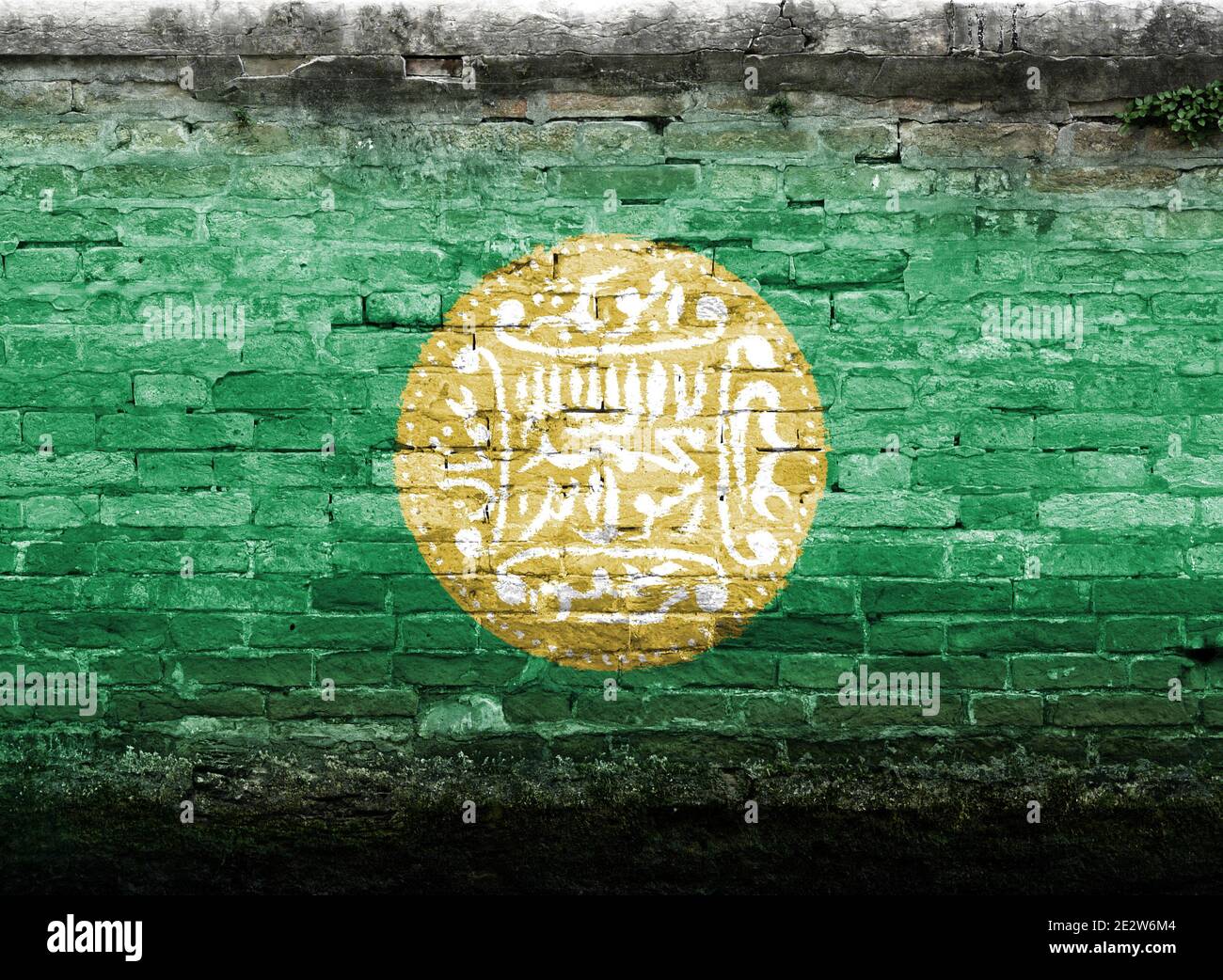 Rohingya flag painted on a brick wall, Background texture Stock Photo