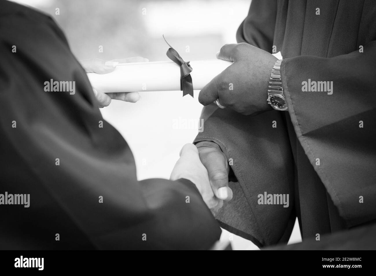 Caucasian woman receiving hand Black and White Stock Photos & Images ...