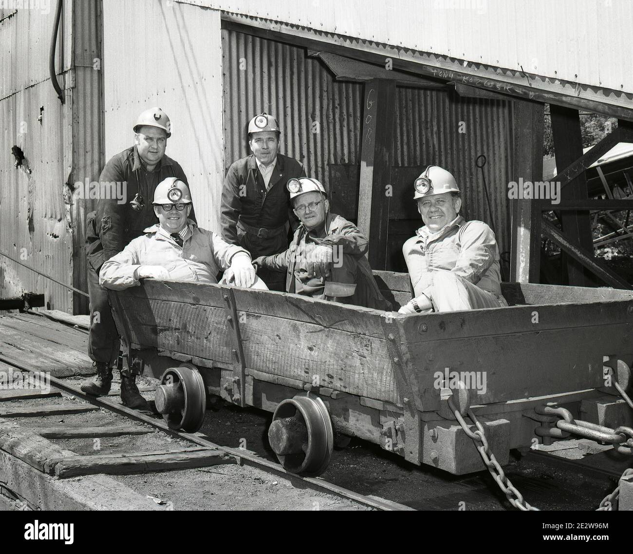 Photographed in May 1972, these mine workers in Wanamie, Newport Township, Luzerne County, enter one of the last underground coal mines operating in the 1970s in the Wyoming Valley. This is the Forge Slope of The Blue Coal Corporation, a subsidiary of the Glen Alden Coal Company. Mined Coal was sent to the Huber Breaker in Ashley PA. At it's peak the Huber  processed 7,000 tons of Anthracite coal per day. The final product was sprayed with a blue dye and sold as “Blue Coal.” Railcars were loaded underneath the breaker and shipped to markets. Stock Photo