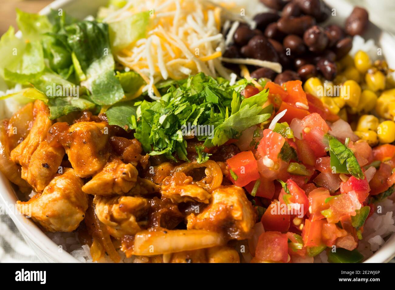 Homemade Healthy Chicken Burrito Bowl with Salsa Corn and Beans Stock