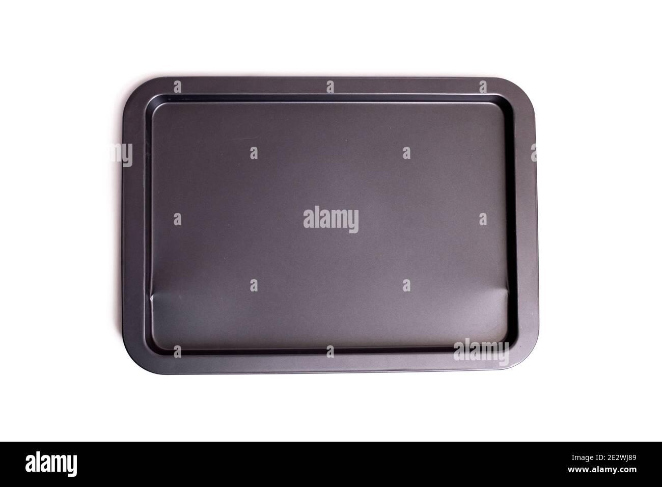 Metal baking sheet for cooking isolated on a white background Stock
