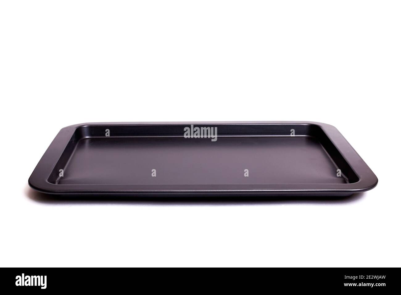 Metal baking sheet for cooking isolated on a white background Stock