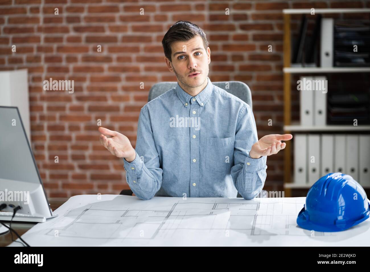 Architect In Online Video Conference Call On Desktop Computer Stock ...