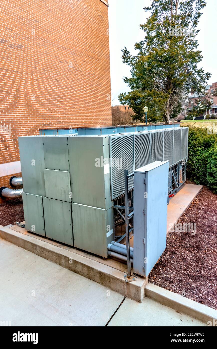 Vertical shot of a heavy air conditioning system for a large residential building. Stock Photo