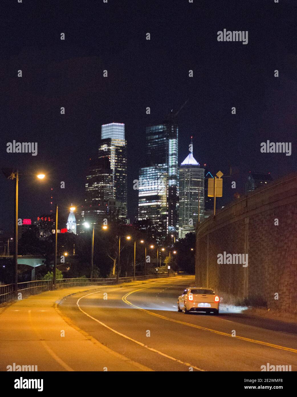 Philadelphia Pennsylvania Night time skyline, car with light trails Stock Photo
