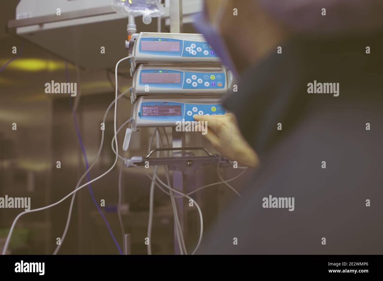 Doctor controls technical support during surgery. Stock Photo