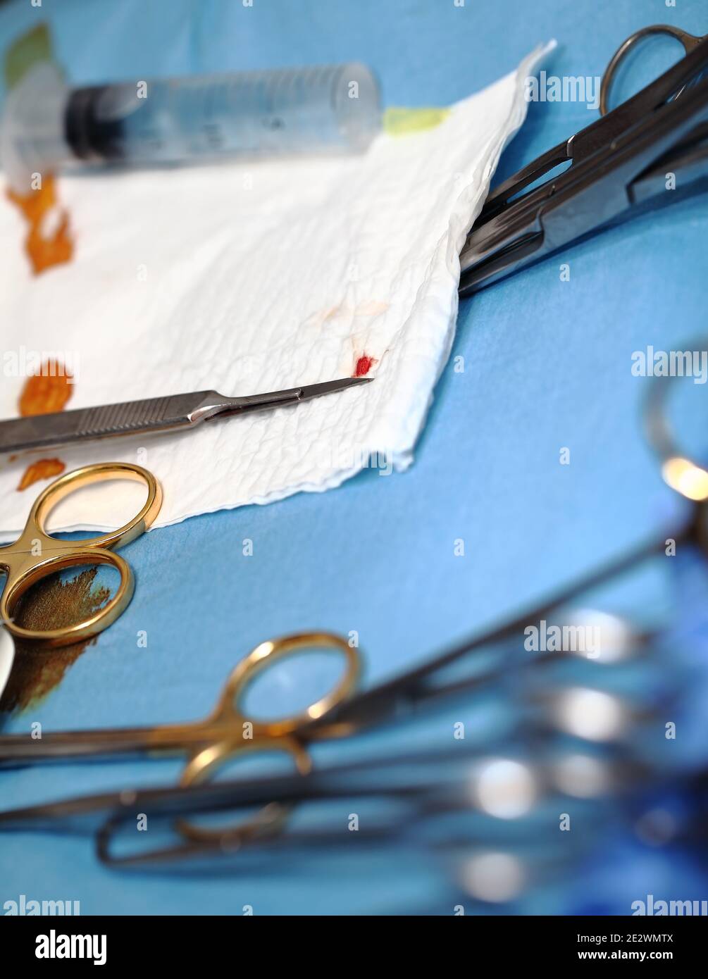Surgical tools on the drape sheet. Stock Photo