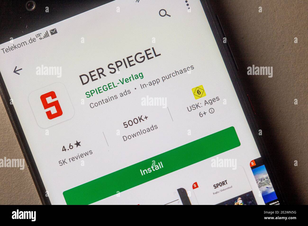 Neckargemuend, Germany: January 15, 2021: app icon of of the German news magazine "Der Spiegel" (the mirror) in the google app store on phone screen t Stock Photo