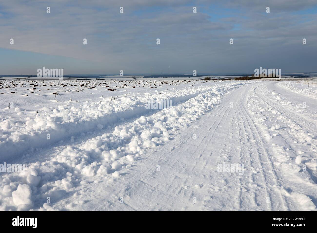 Winter landscape with snowy fields and blue sky Stock Photo - Alamy