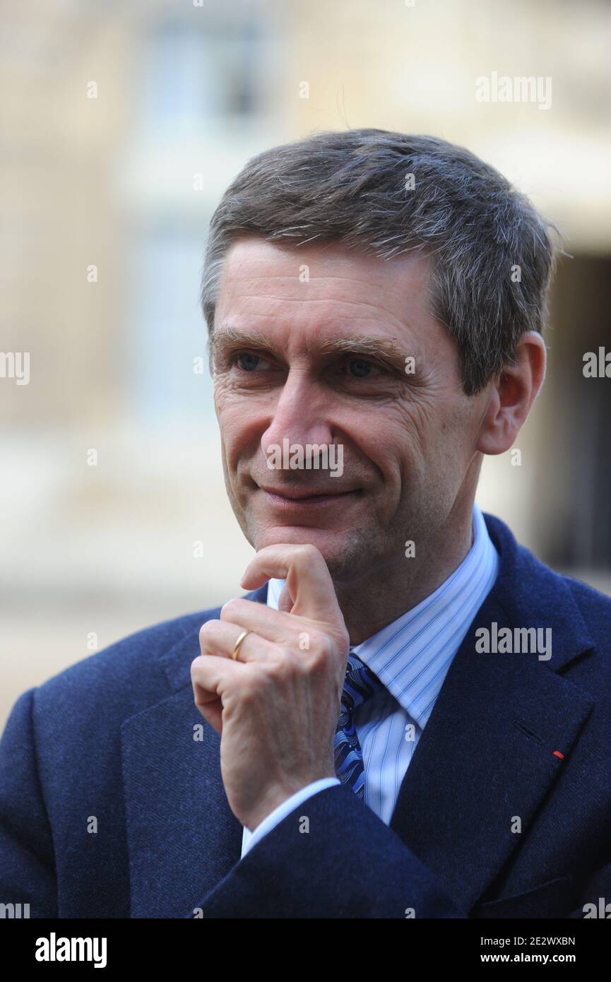 French National police director general Frederic Pechenard leaves