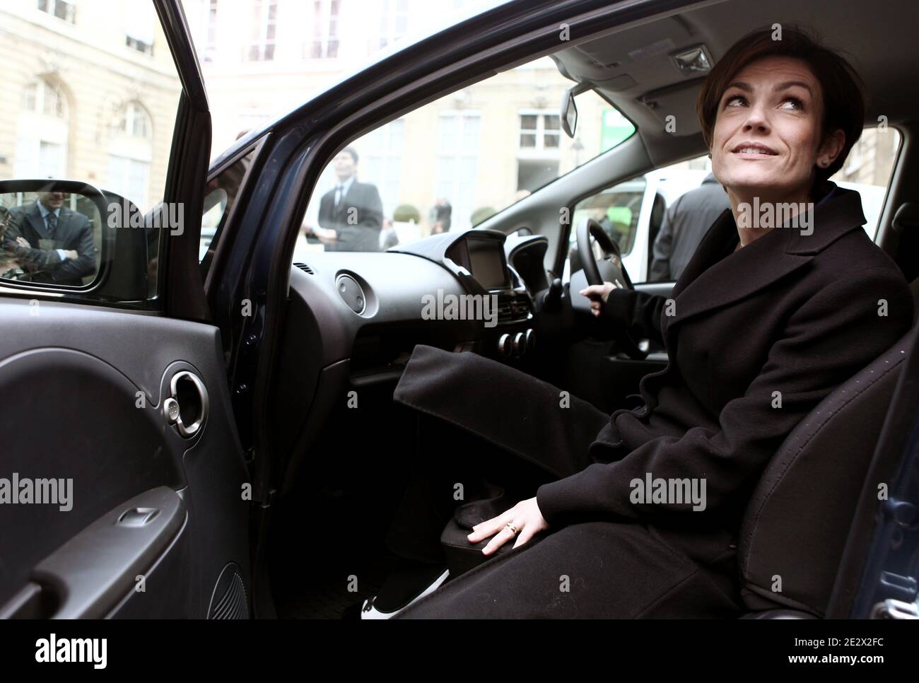 French Junior ecology minister Chantal Jouanno is pictured in the Peugeot iOn electric car in the courtyard of the Ecology ministry after a meeting focus on electric and hybrid cars development in Paris, France on April 13th, 2010. Photo by Stephane Lemouton/ABACAPRESS.COM Stock Photo
