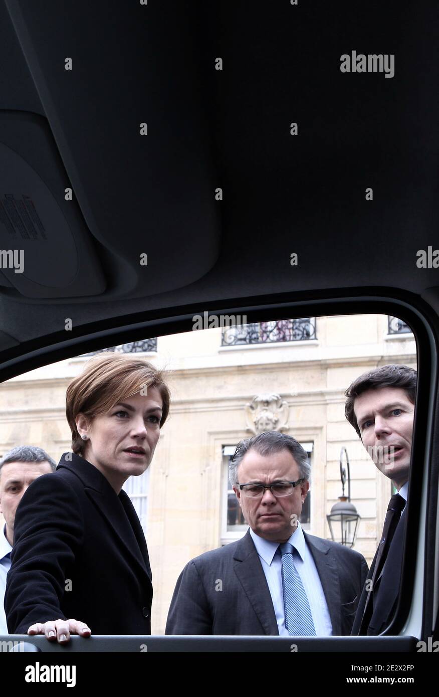 French Junior ecology minister Chantal Jouanno is pictured near the Peugeot iOn electric car in the courtyard of the Ecology ministry after a meeting focus on electric and hybrid cars development in Paris, France on April 13th, 2010. Photo by Stephane Lemouton/ABACAPRESS.COM Stock Photo