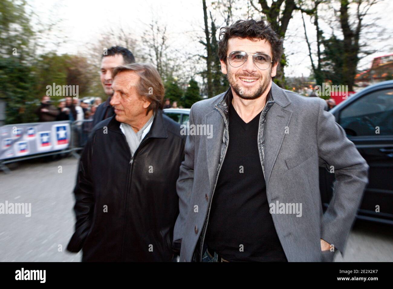 French singer and actor Patrick Bruel and director Alexandre Arcady arrive at the premiere of his last film 'Comme les 5 doigts de la main' in Kinepolis cinema in Lomme, north of France, on April 12, 2010. Photo by Mikael LIbert/ABACAPRESS.COM Stock Photo
