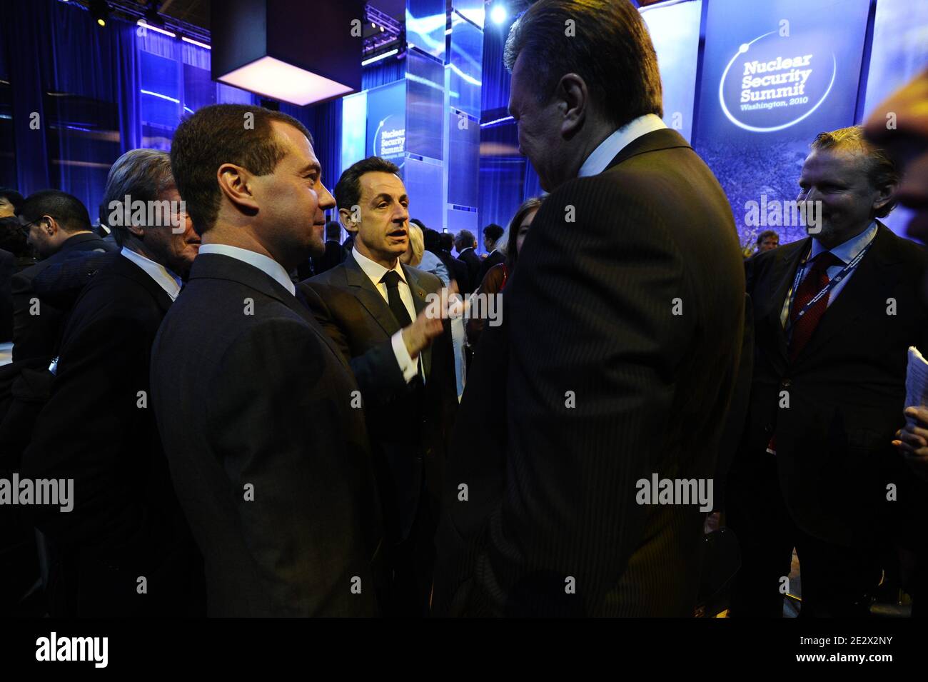 French President Nicolas Sarkozy speaks with Foreign Minister Bernard Kouchner, Russian President Dmitry Medvedev and Ukrainian President Viktor Yanukovych nd behind French President'e diplomatic advisor and sherpa Jean-David Levitte during the opening plenary of the Nuclear Security Summit with U.S. President at the Washington Convention Center in Washington, DC, USA, on April 13, 2010. Photo by Elodie Gregoire/ABACAPRESS.COM Stock Photo