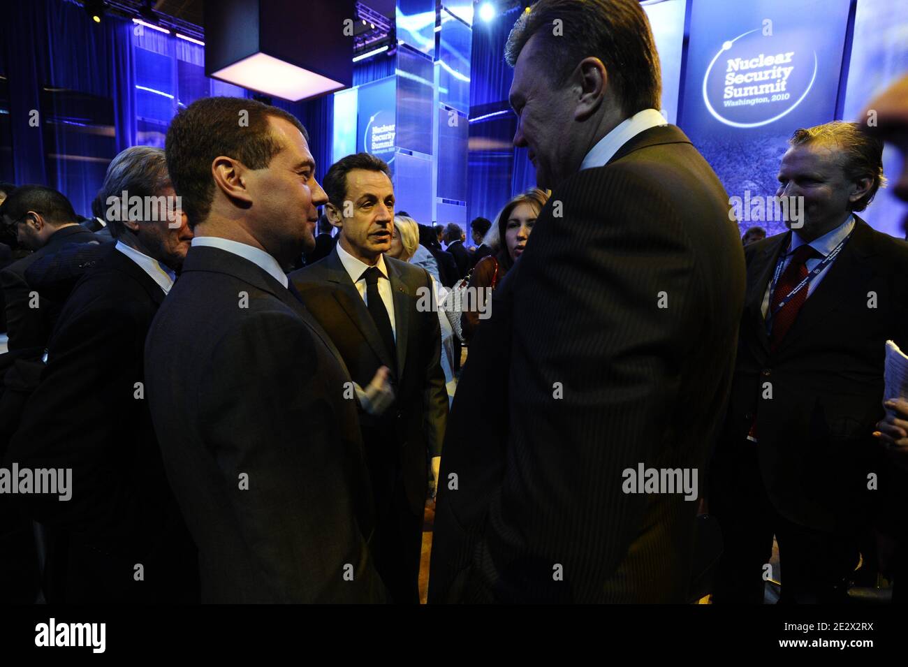 French President Nicolas Sarkozy speaks with Foreign Minister Bernard Kouchner, Russian President Dmitry Medvedev and Ukrainian President Viktor Yanukovych nd behind French President'e diplomatic advisor and sherpa Jean-David Levitte during the opening plenary of the Nuclear Security Summit with U.S. President at the Washington Convention Center in Washington, DC, USA, on April 13, 2010. Photo by Elodie Gregoire/ABACAPRESS.COM Stock Photo