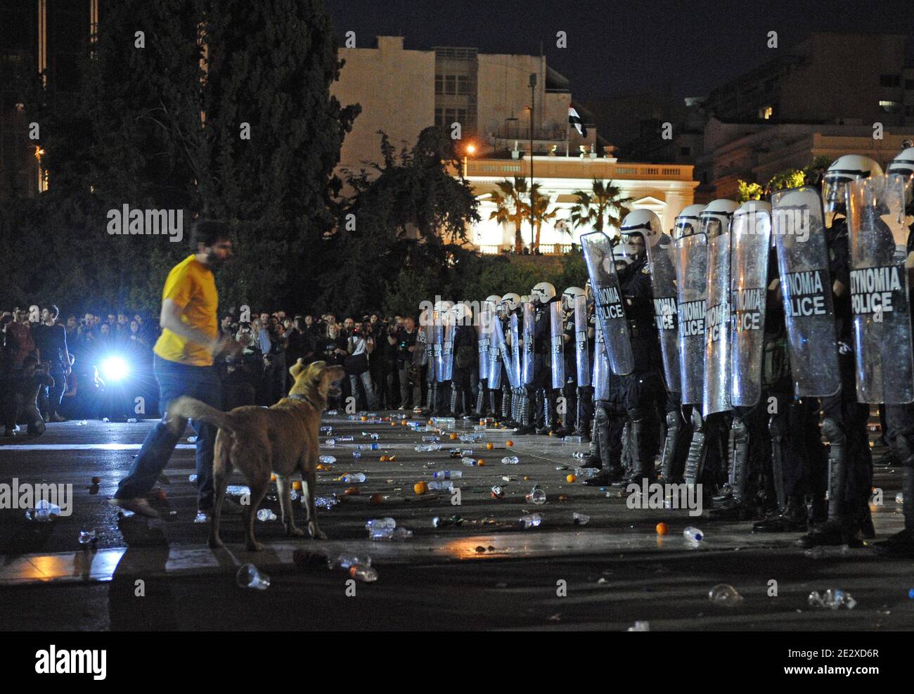 Greek riot policemen clash with protestors front the parliament in Athens, Greece on May 6, 2010. Riots broke out across the Greek capital during a massive protest against drastic austerity measures introduced to secure rescue loans for the country's near-bankrupt economy. Photo by Mousse/ABACAPRESS.COM Stock Photo