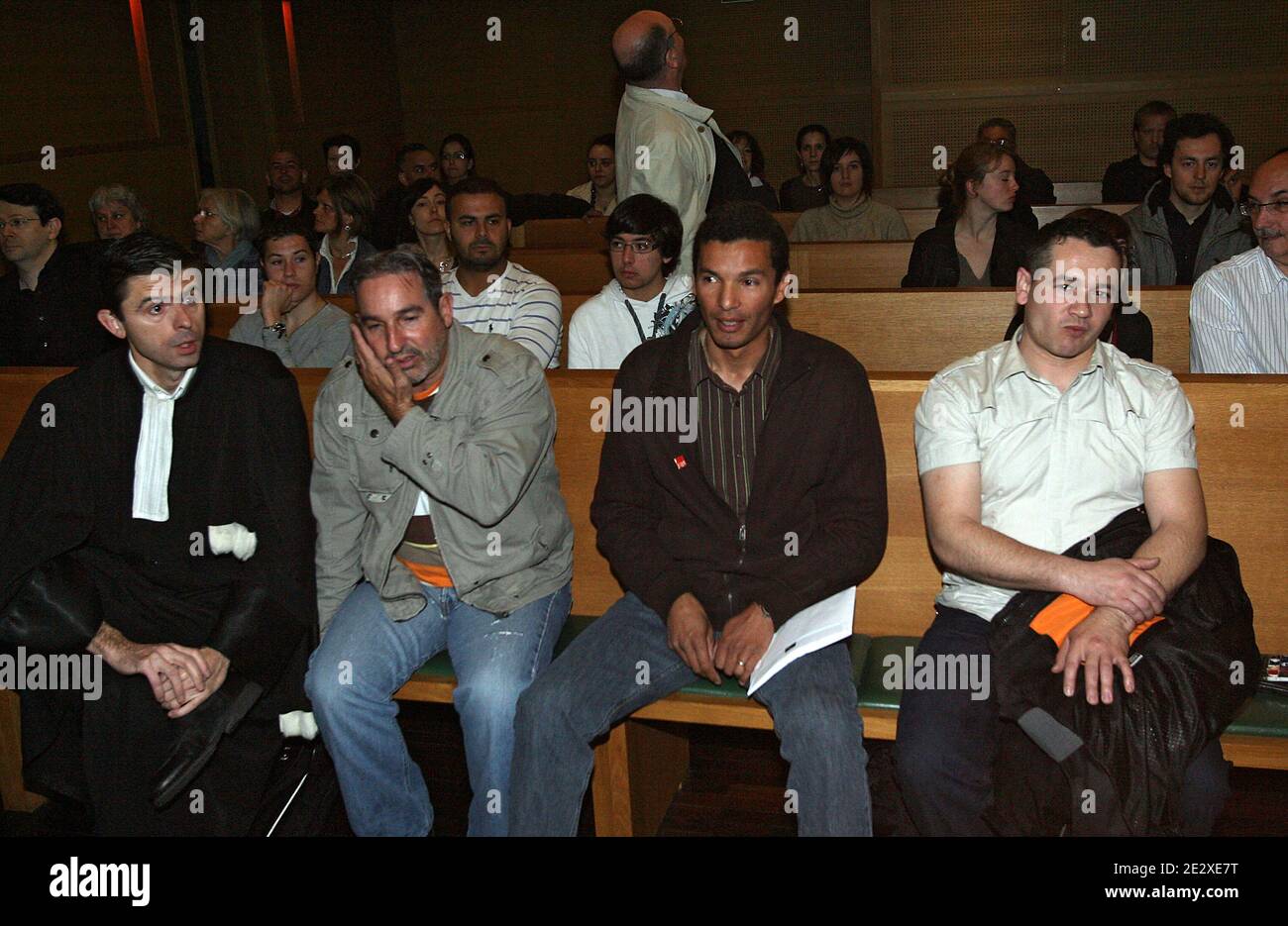 Colleagues of French armored bank van driver Toni Musulin, Philippe  Ferrero, Swedish security firm Loomis CGT representative Khader Benguesh  and Didier Matrundola wait for the start of Musulin's trial, at the  courthouse