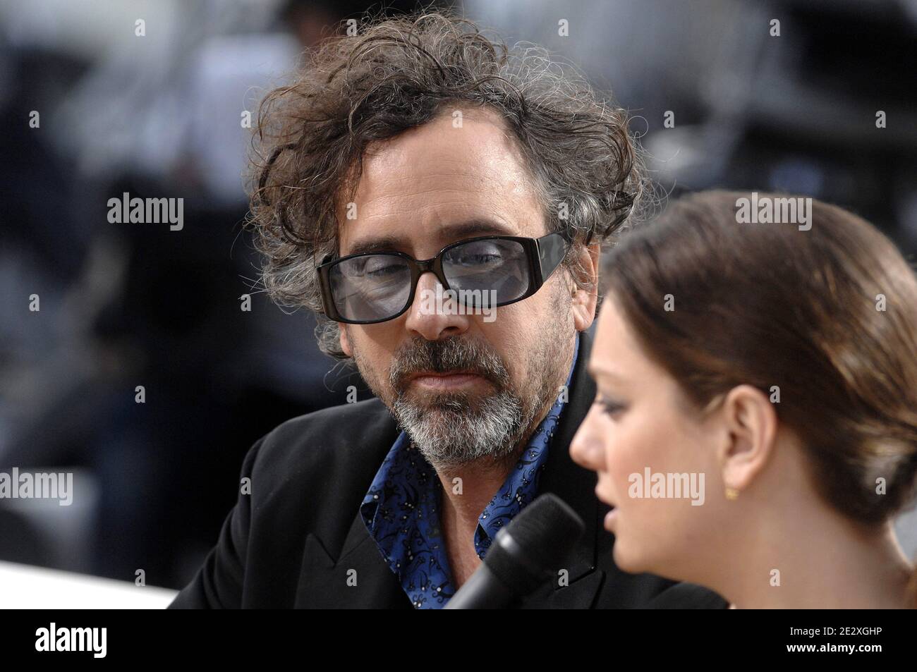 Tim Burton and Giovanna Mezzogiorno during the broadcasting of 'Le Grand  Journal' TV show on Canal Plus channel on the Martinez beach during the  63rd Cannes Film Festival in Cannes, France on