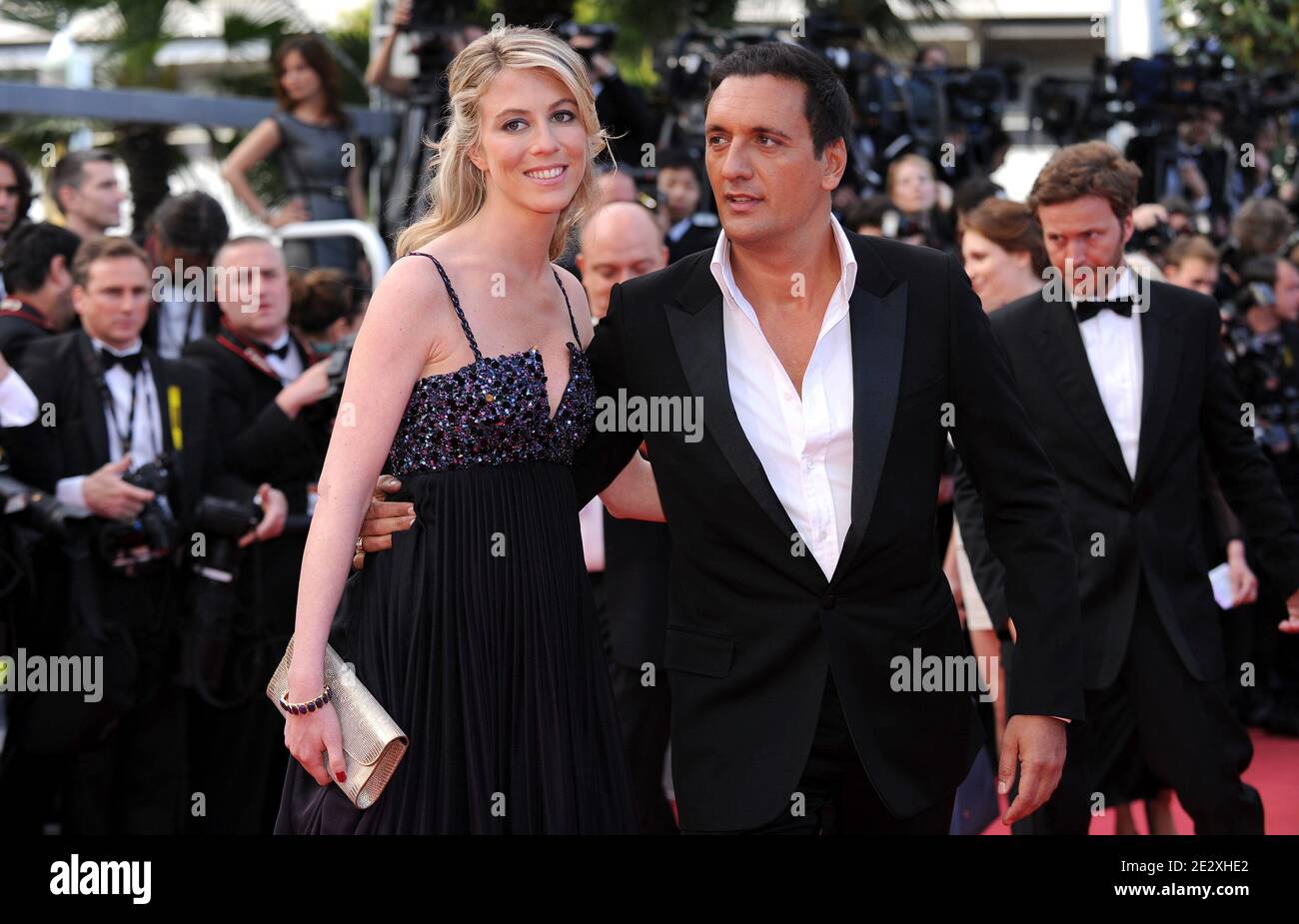 Dany Brillant and his girlfriend Nathalie Moury arriving at the premiere of  'Wall Street: Money Never Sleeps' presented out of competition during the  63rd Cannes Film Festival in Cannes, southern France on