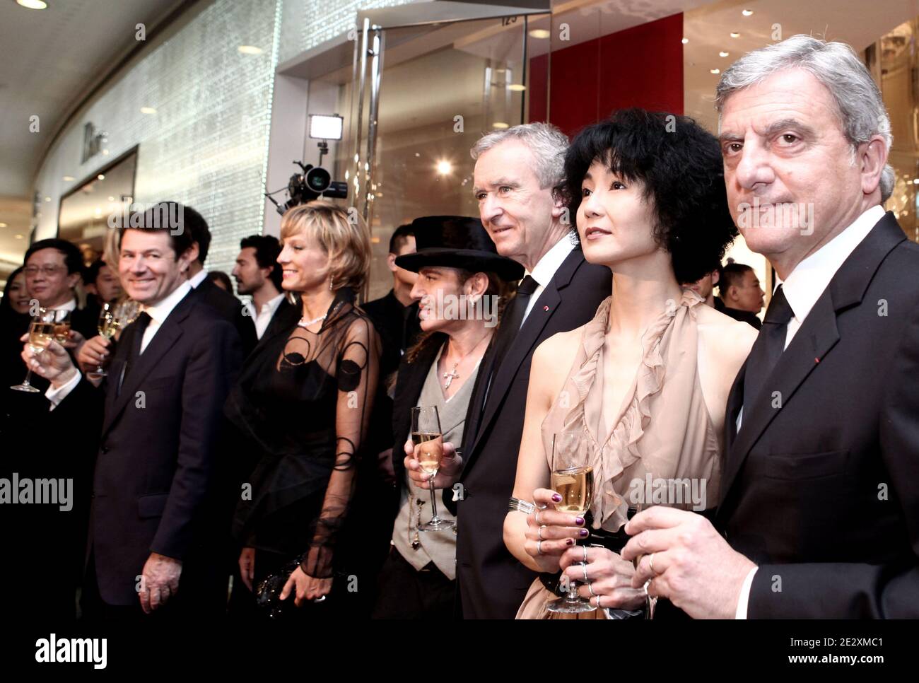 British photographer Vanessa Beecroft and LVMH CEO Bernard Arnault and his  wife Helene, at the inauguration party of 'L'espace Louis Vuitton' where  she exhibits her pictures, on the Champs Elysee Avenue, in