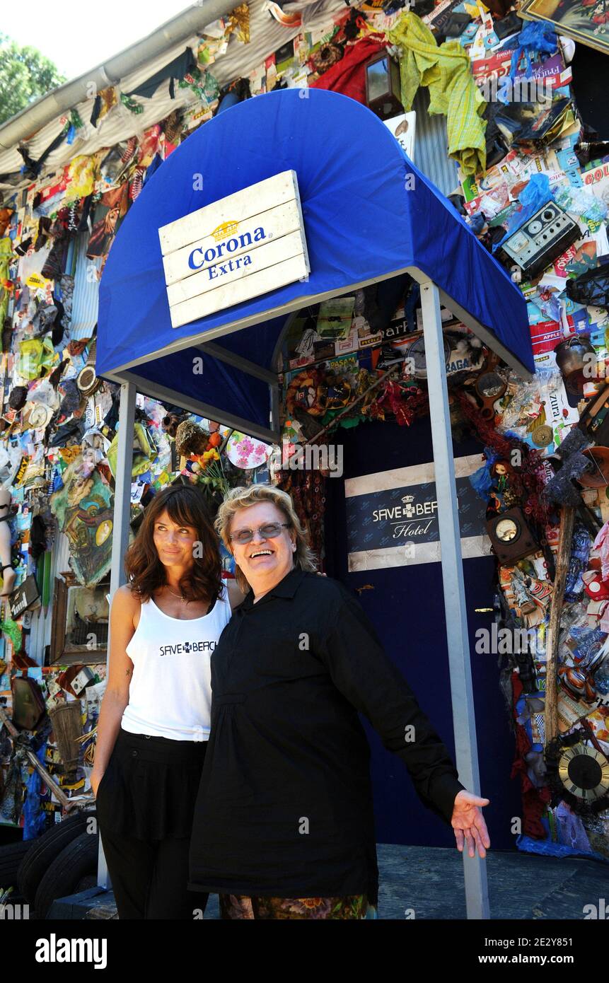 Supermodel Helena Christensen and German action artist HA Schult at the