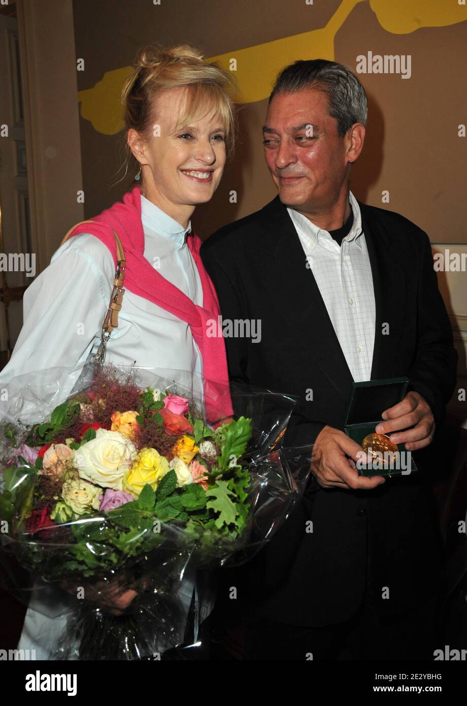 US novelist Paul Auster and his wife Siri Hustvedt during an award ceremony  after he received the 'Grand Vermeil' medal from the mayor of Paris  Bertrand Delanoe, on June 10, 2010 in