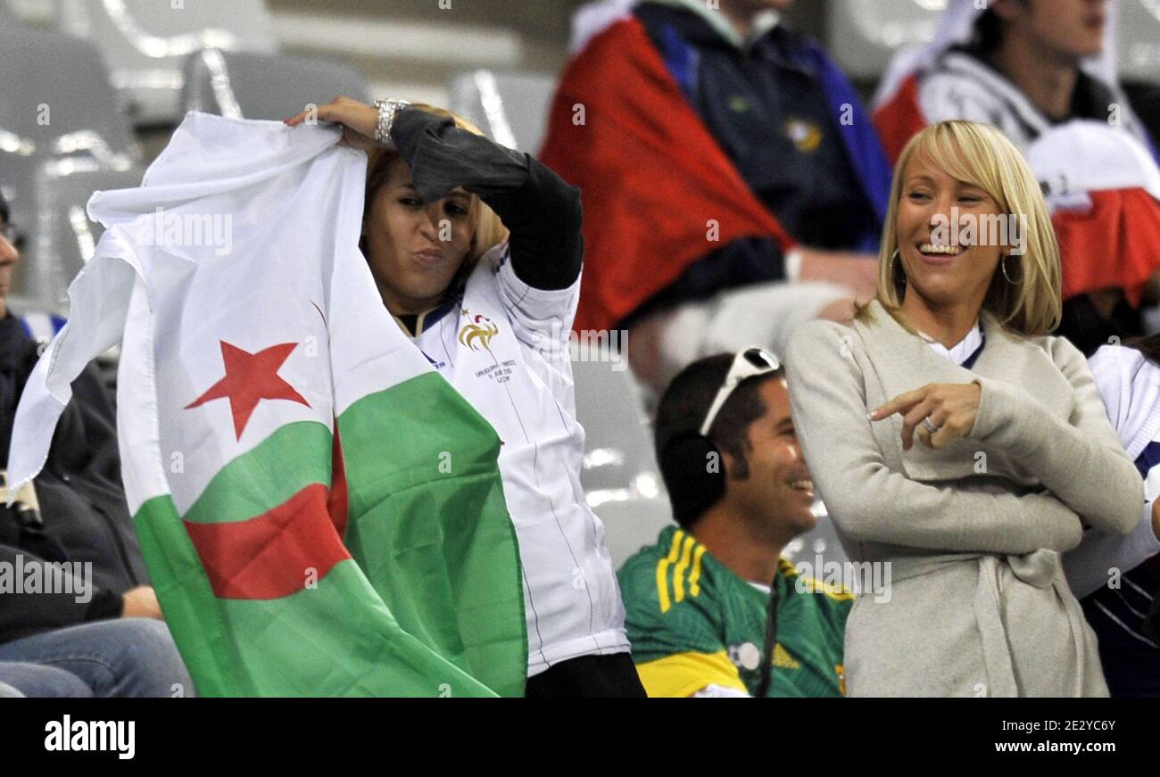 French national football team players' wives, France's striker Franck Ribery's wife Wahiba wears an Algerian flag and France's striker Patrice Evra's wife Sandra during the FIFA World Cup soccer match, France vs Uruguay in Capetown, South Africa, on June 11, 2010. France 0-Uruguay 0. Photo by Christophe Guibbaud/Cameleon/ABACAPRESS.COM Stock Photo