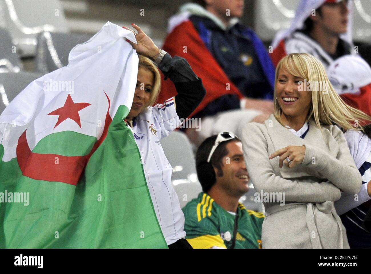 French national football team players' wives, France's striker Franck Ribery's wife Wahiba wears an Algerian flag and France's striker Patrice Evra's wife Sandra during the FIFA World Cup soccer match, France vs Uruguay in Capetown, South Africa, on June 11, 2010. France 0-Uruguay 0. Photo by Christophe Guibbaud/Cameleon/ABACAPRESS.COM Stock Photo