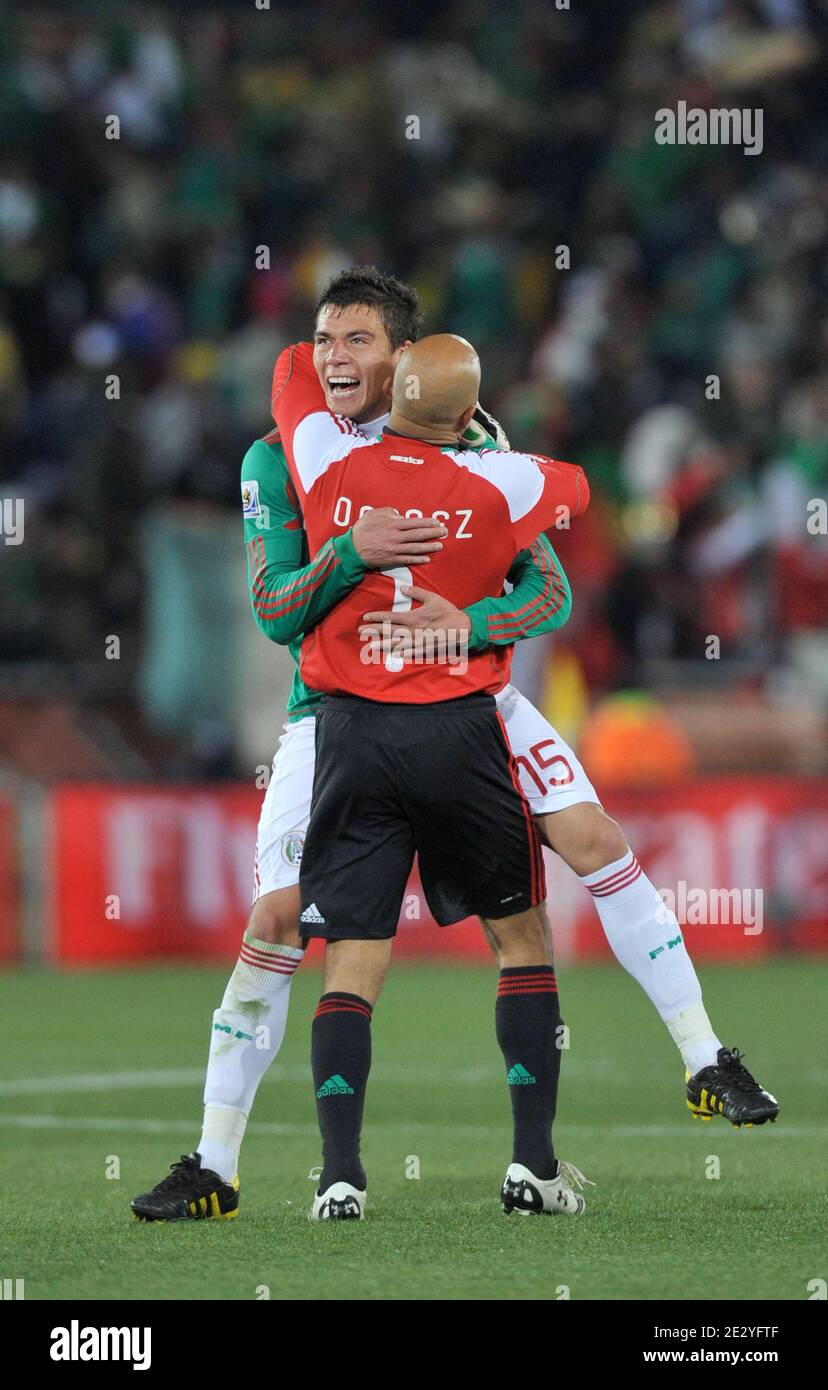 Mexico's Hector Moreno celebrates with his goal keeper Oscar Perez after winning during the 2010 FIFA World Cup soccer match, Group A, France vs Mexico at Peter Mokaba Stadium, in Polokwane, South Africa on June 17, 2010. Mexico won 2-0. Photo by Christophe Guibbaud/Cameleon/ABACAPRESS.COM Stock Photo