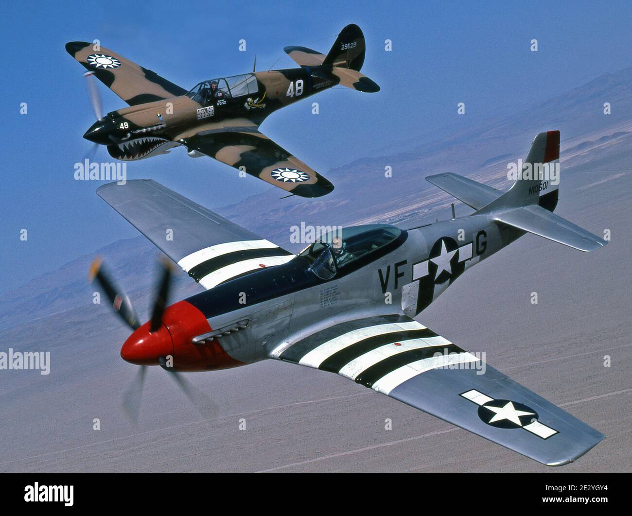 General Chuck Yeager and General Joe Engle flying WWII Fighters. Stock Photo