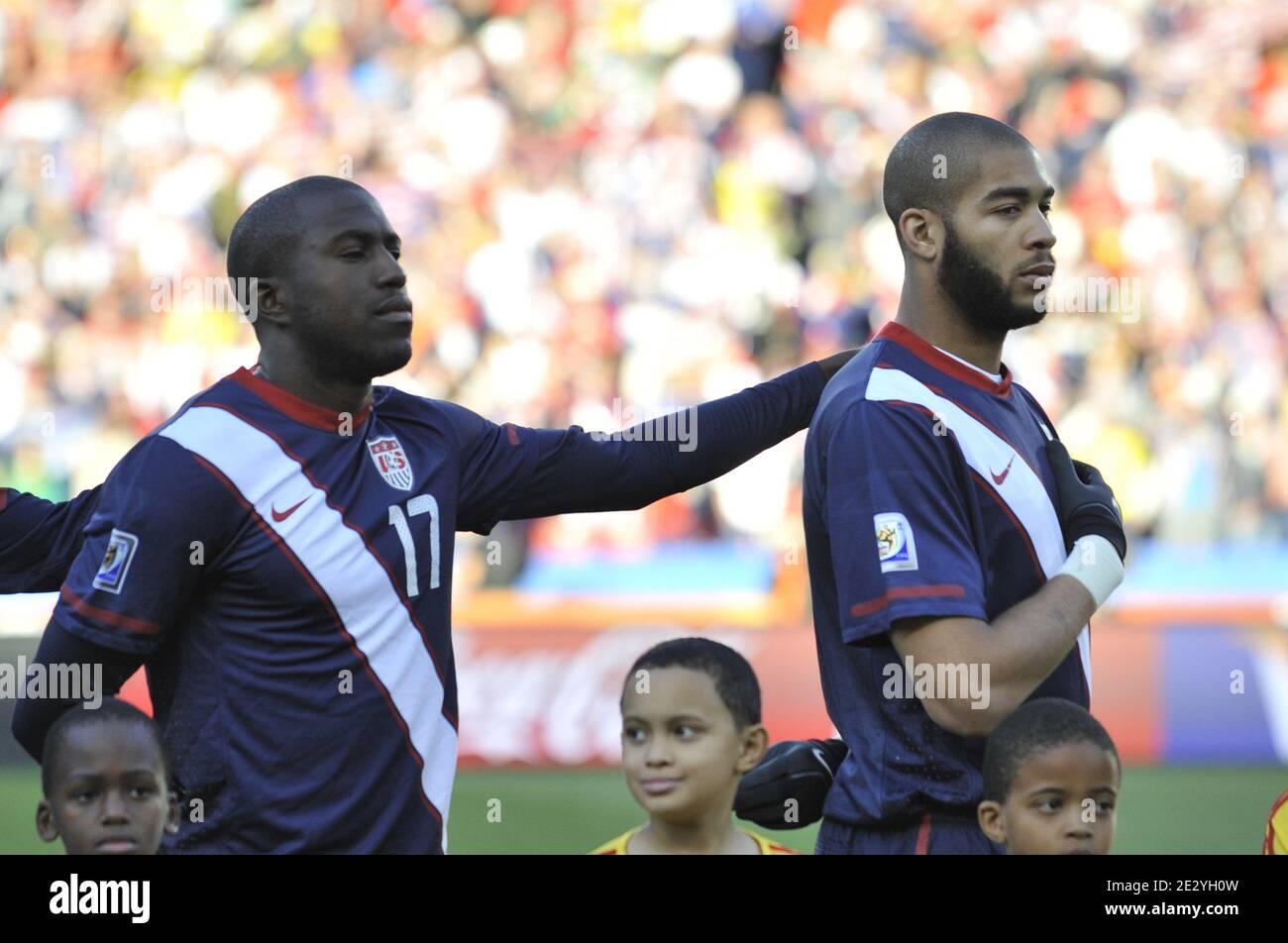 USA's Jozy Altidore and Oguchi Onyewu during the national anthem during the 2010 FIFA World Cup soccer match, Group C, Slovenia vs USA at Ellis Park Stadium, in Johannesburg, South Africa on June 18, 2010. The match ended in a 2-2 draw. Photo by Christophe Guibbaud/Cameleon/ABACAPRESS.COM Stock Photo