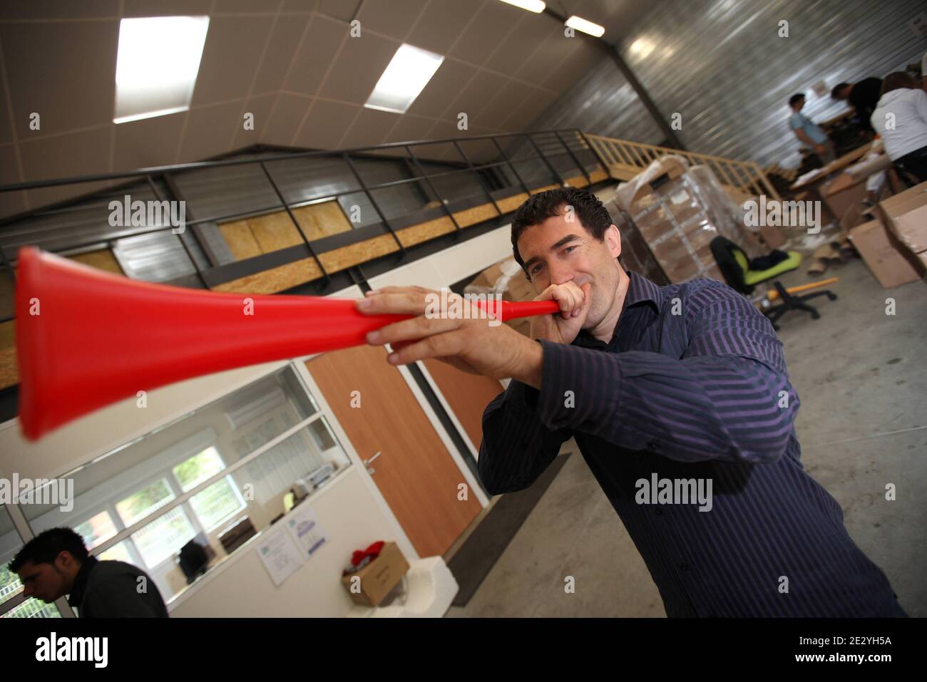 Jose Pecci is the FranceÕs exclusive importer of vuvuzelas. He runs AGM-TEC, based at Beauzelle in the outskirts of Toulouse, southern France, on June 19, 2010. Photo by Manuel Blondeau/ABACAPRESS.COM Stock Photo