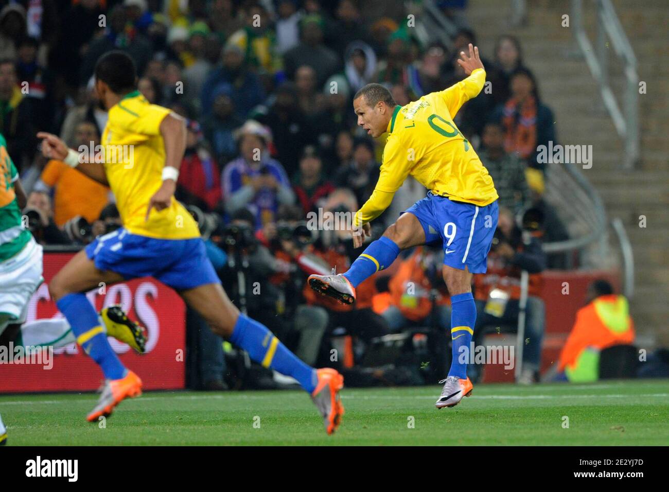 Brazil's Luis Fabiano scoring the 1-0 goal during the 2010 FIFA World Cup South Africa Soccer match, group G, Brazil vs Ivory Coast at Soccer City football stadium in Johannesburg, South Africa on June 20, 2010. Brazil won 3-1. Photo by Henri Szwarc/ABACAPRESS.COM Stock Photo