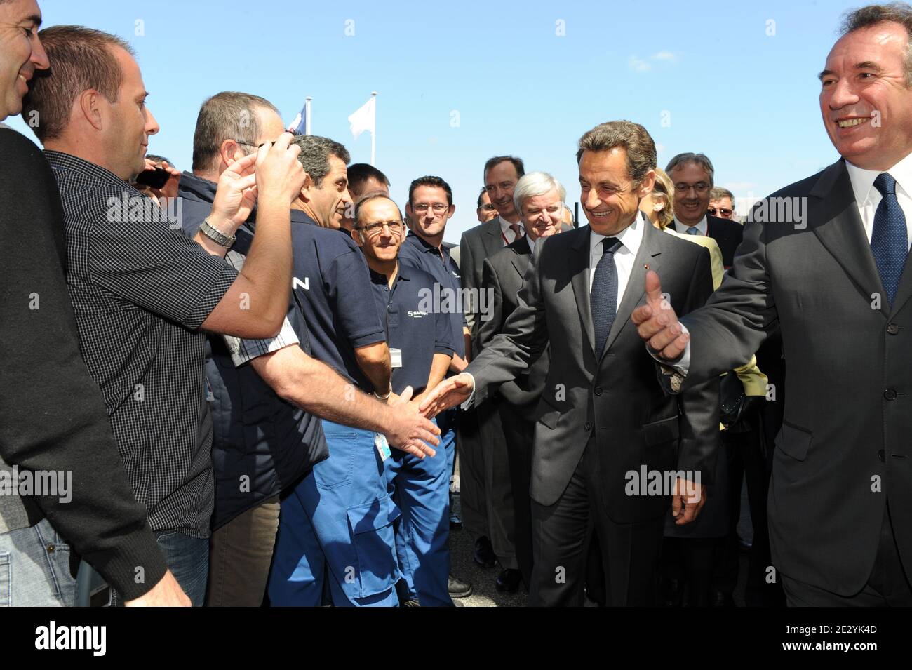 French President Nicolas Sarkozy flanked by Francois Bayrou inaugurates  Turbomeca's Joseph Szydlowski plant in a ceremony attended by Jean Paul  Herteman, CRO of Safran, and Pierre Fabre, Chairman and Ceo of Turbomeca,
