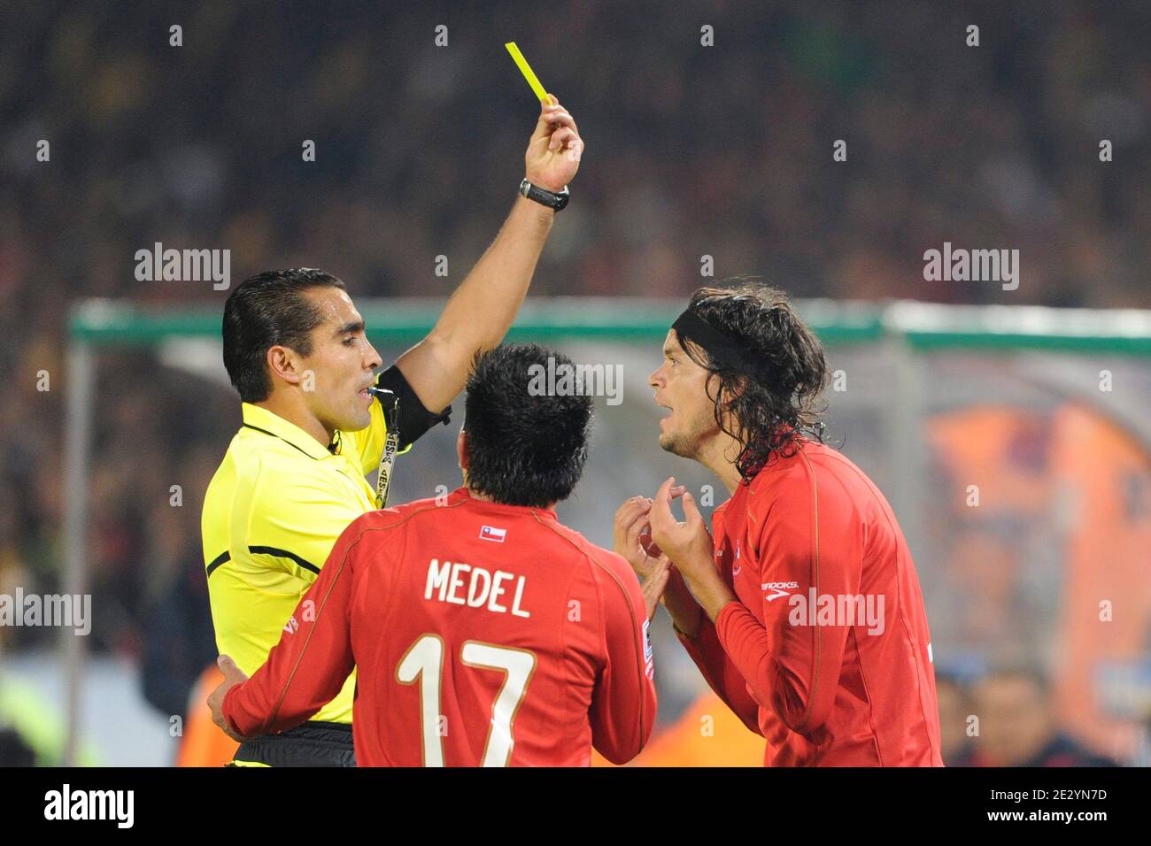 Referee Marco Rodriguez gives a yellow card to Chile's Waldo Ponce during the 2010 FIFA World Cup South Africa Soccer match, group H, Spain vs Chile at Loftus Versfeld football stadium in Pretoria, South Africa on June 25, 2010. Spain won 2-1. Photo by Henri Szwarc/ABACAPRESS.COM Stock Photo