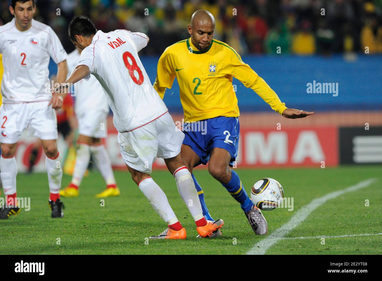 Brazil's Maicon battles Chile's Arturo Vidal during the 2010 FIFA World Cup South Africa 1/8 of final Soccer match, Brazil vs Chile at Ellis Park football stadium in Johannesburg, South Africa on June 28, 2010. Brazil won 3-0. Photo by Henri Szwarc/Cameleon/ABACAPRESS.COM Stock Photo