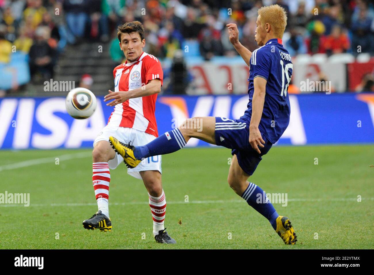 Paraguay's Edgar Benitez and Japan's Keisuke Honda fight for the ball during the 2010 FIFA World Cup South Africa 1/8 of final Soccer match, Paraguay vs Japan at Loftus Versfeld football stadium in Pretoria, South Africa on June 29, 2010. Paraguay won 0-0 (5p to 3 after penalties). Photo by Henri Szwarc/ABACAPRESS.COM Stock Photo