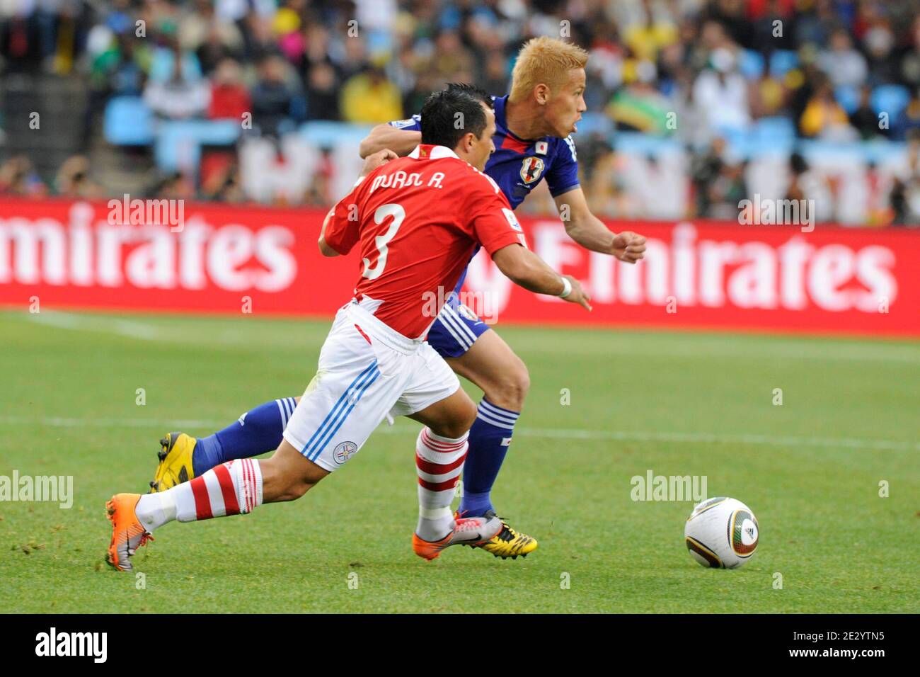 Paraguay's Claudio Morel and Japan's Keisuke Honda fight for the ball during the 2010 FIFA World Cup South Africa 1/8 of final Soccer match, Paraguay vs Japan at Loftus Versfeld football stadium in Pretoria, South Africa on June 29, 2010. Paraguay won 0-0 (5p to 3 after penalties). Photo by Henri Szwarc/ABACAPRESS.COM Stock Photo