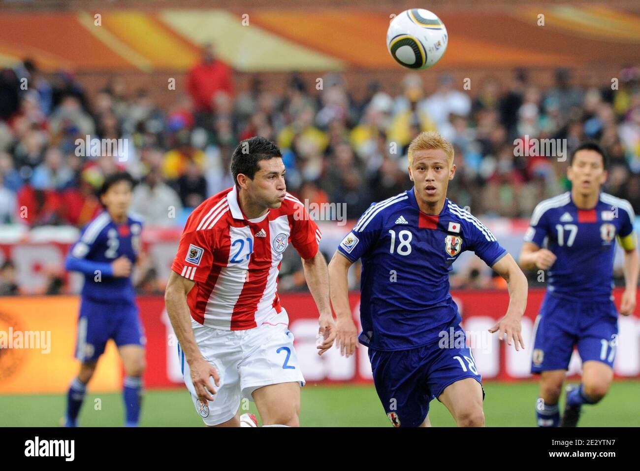 Paraguay's Antolin Alcaraz and Japan's Keisuke Honda during the 2010 FIFA World Cup South Africa 1/8 of final Soccer match, Paraguay vs Japan at Loftus Versfeld football stadium in Pretoria, South Africa on June 29, 2010. Paraguay won 0-0 (5p to 3 after penalties). Photo by Henri Szwarc/ABACAPRESS.COM Stock Photo