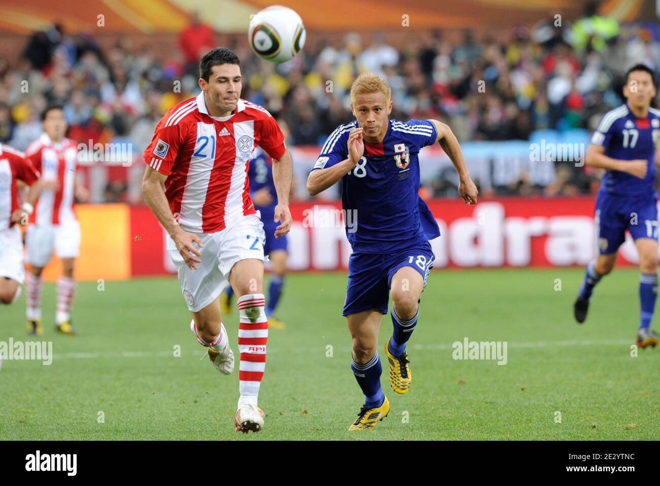 Paraguay's Antolin Alcaraz and Japan's Keisuke Honda fight for the ball during the 2010 FIFA World Cup South Africa 1/8 of final Soccer match, Paraguay vs Japan at Loftus Versfeld football stadium in Pretoria, South Africa on June 29, 2010. Paraguay won 0-0 (5p to 3 after penalties). Photo by Henri Szwarc/ABACAPRESS.COM Stock Photo